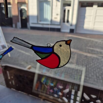 Vogeltje Tiffany licht geel kopje